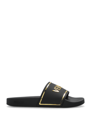 Dolce & Gabbana Leather slides with a logo-shaped appliqué